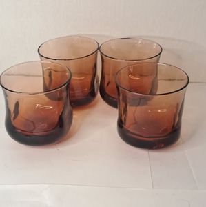 4 Brownish Amber heavy bottomed glasses.